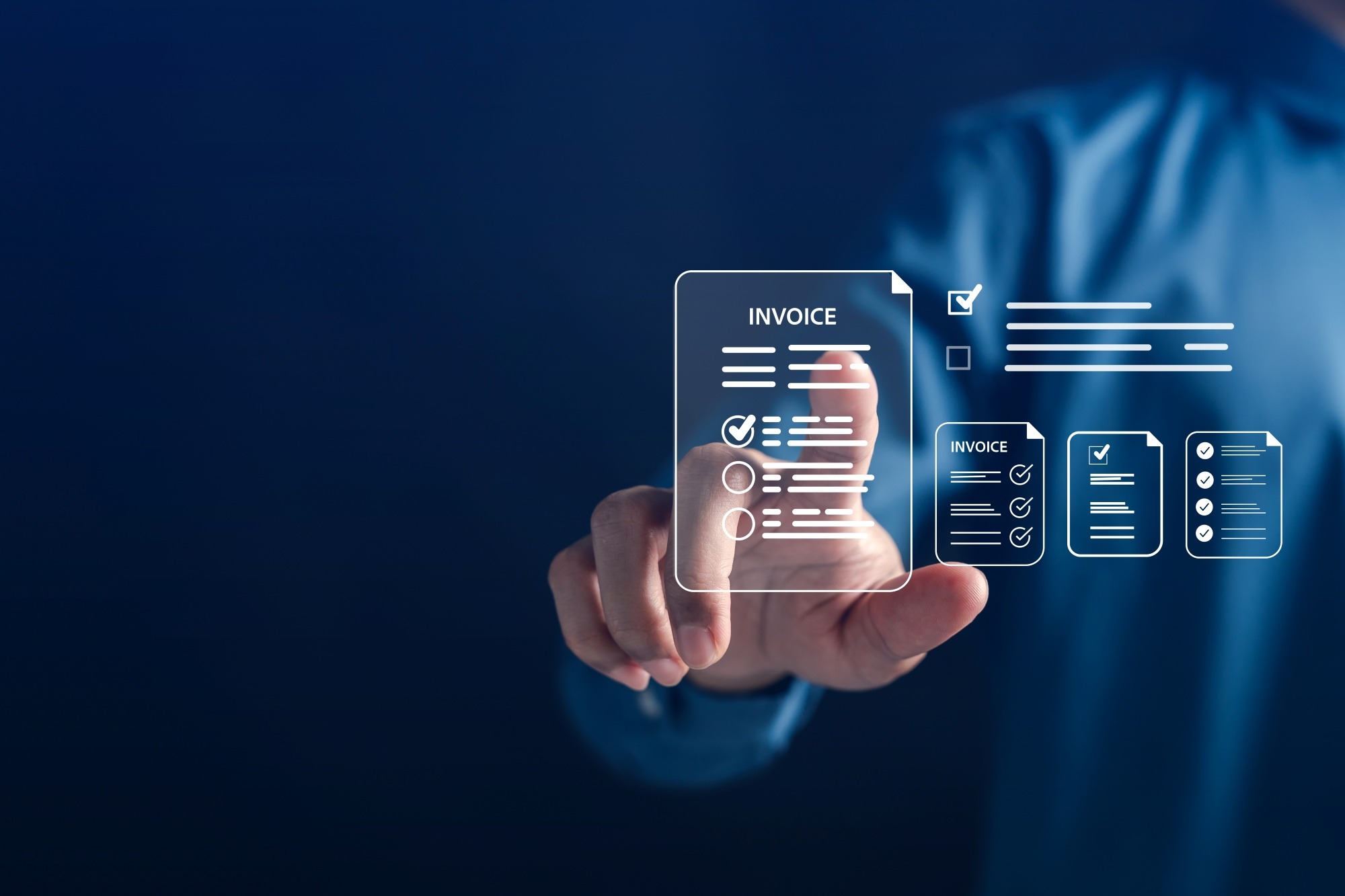 A person’s hand interacts with a digital invoice display, emphasizing modern invoicing technology and digital workflow management.